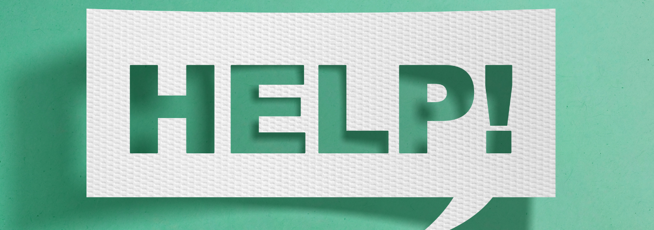 Paper speech bubble, reading, 'help!', against sea foam green background